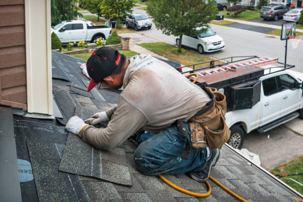 Professional Roofing technician working in Lookeba, OK